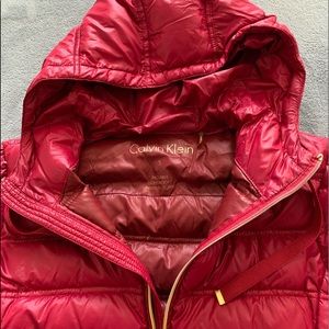 Red and gold Calvin Klein puffer jacket.